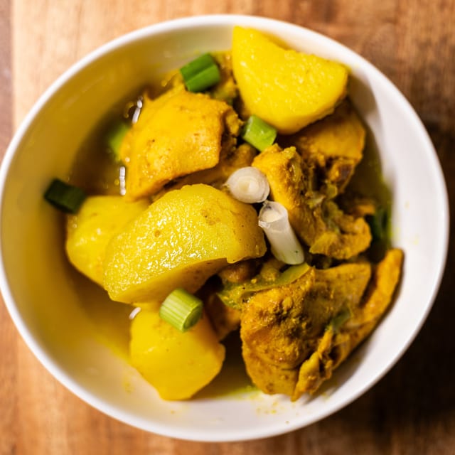 Side of Curry Chicken.